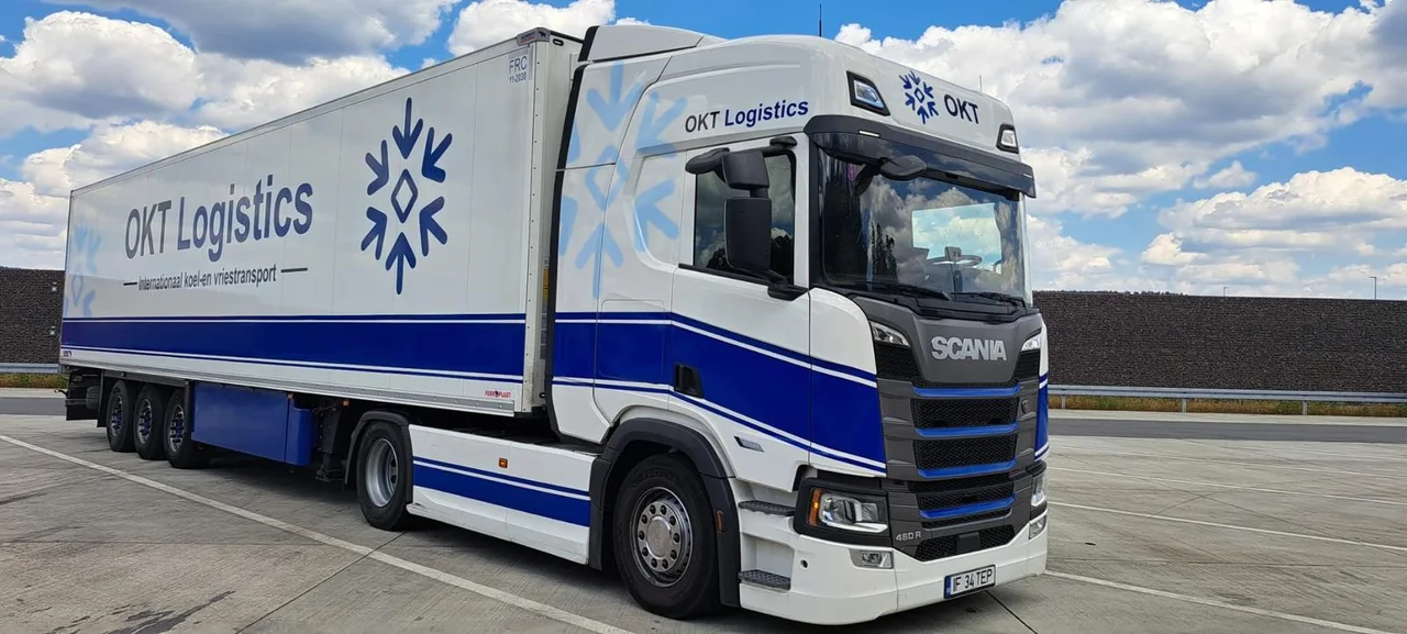 Front and side view of an OKT Logistics truck with refrigerated trailer
